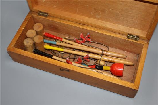 A Victorian miniature croquet set